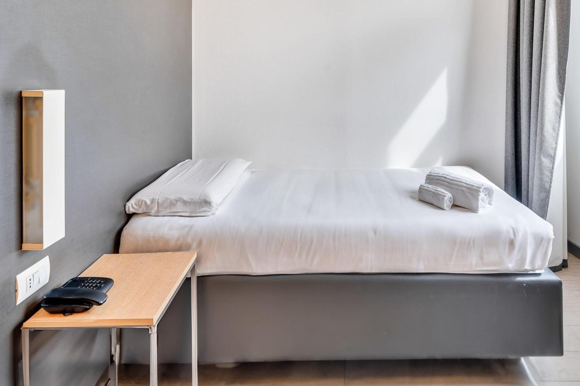 Quarto Queen (1 Adulto)