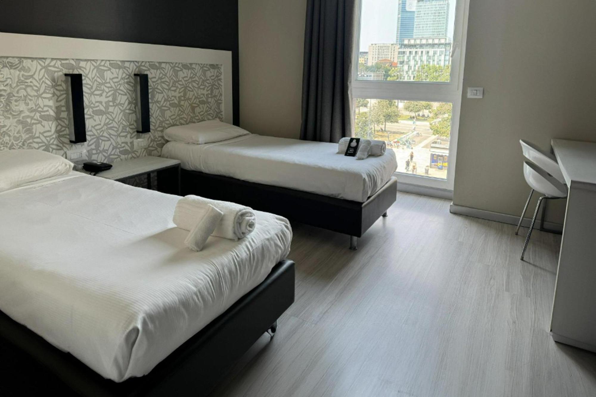 Quarto com 2 Camas de Solteiro